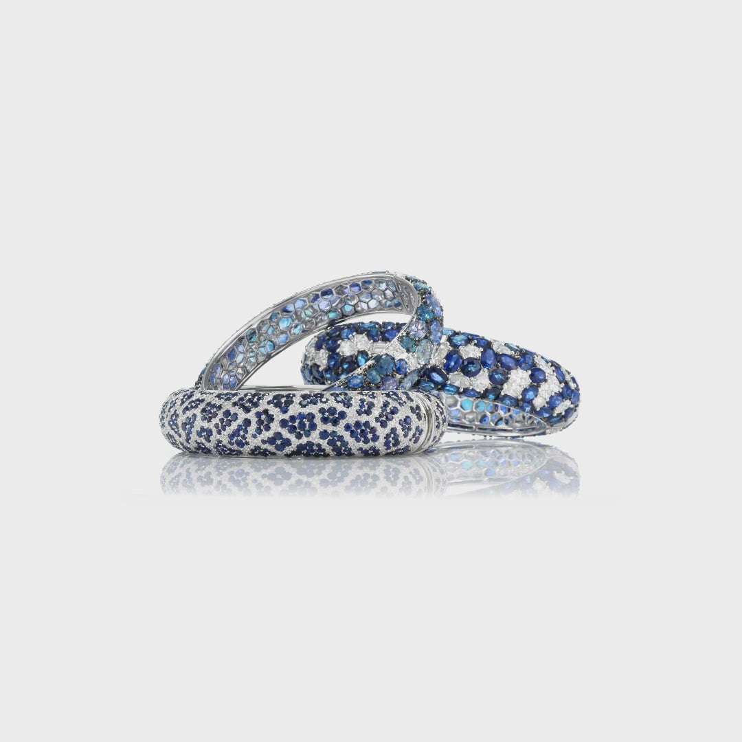 Oval Cut Sapphire and Round Brilliant Cut Diamond Bangle